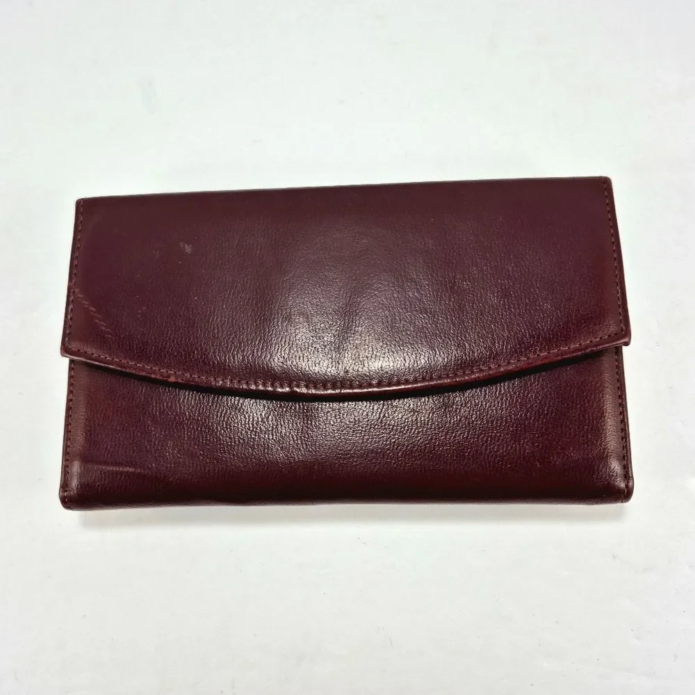 Vintage Full-Grain Cowhide Checkbook-Style Wallet With A Snap Closure.